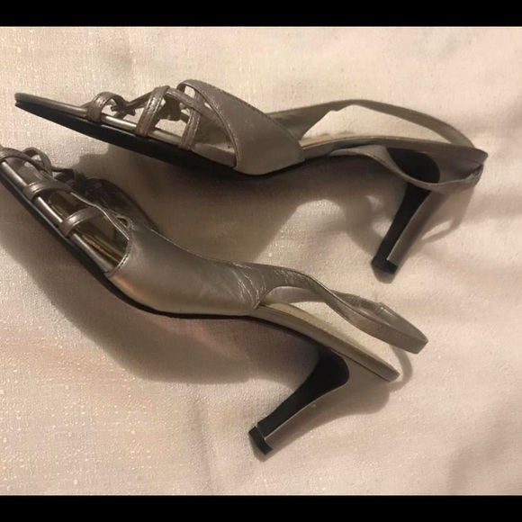 Silver open toe strapped heels. Size 9.5 medium
Lightly used - Like new - Picture 3 of 4
